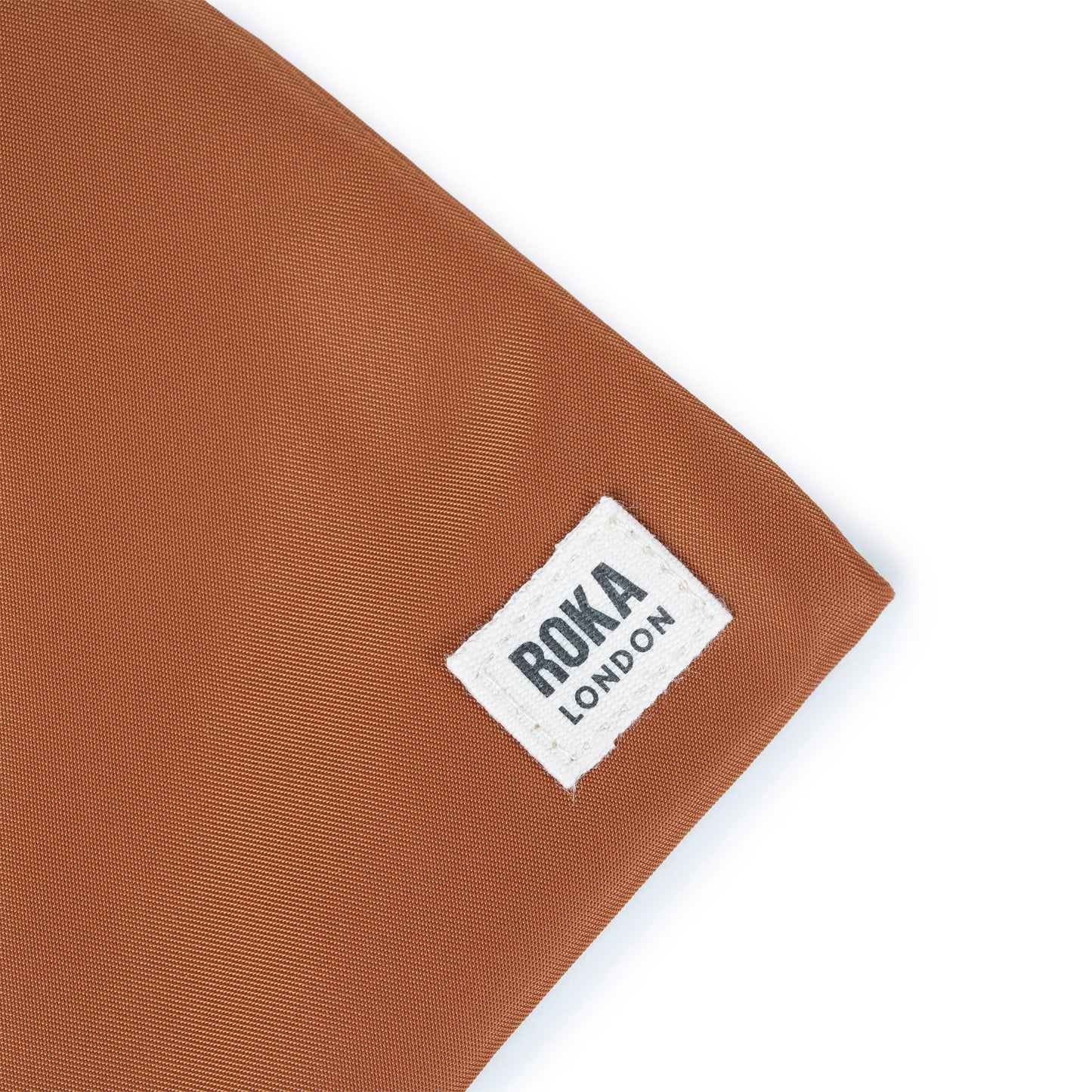 Chelsea Pocket Sling Bag Small in Bran