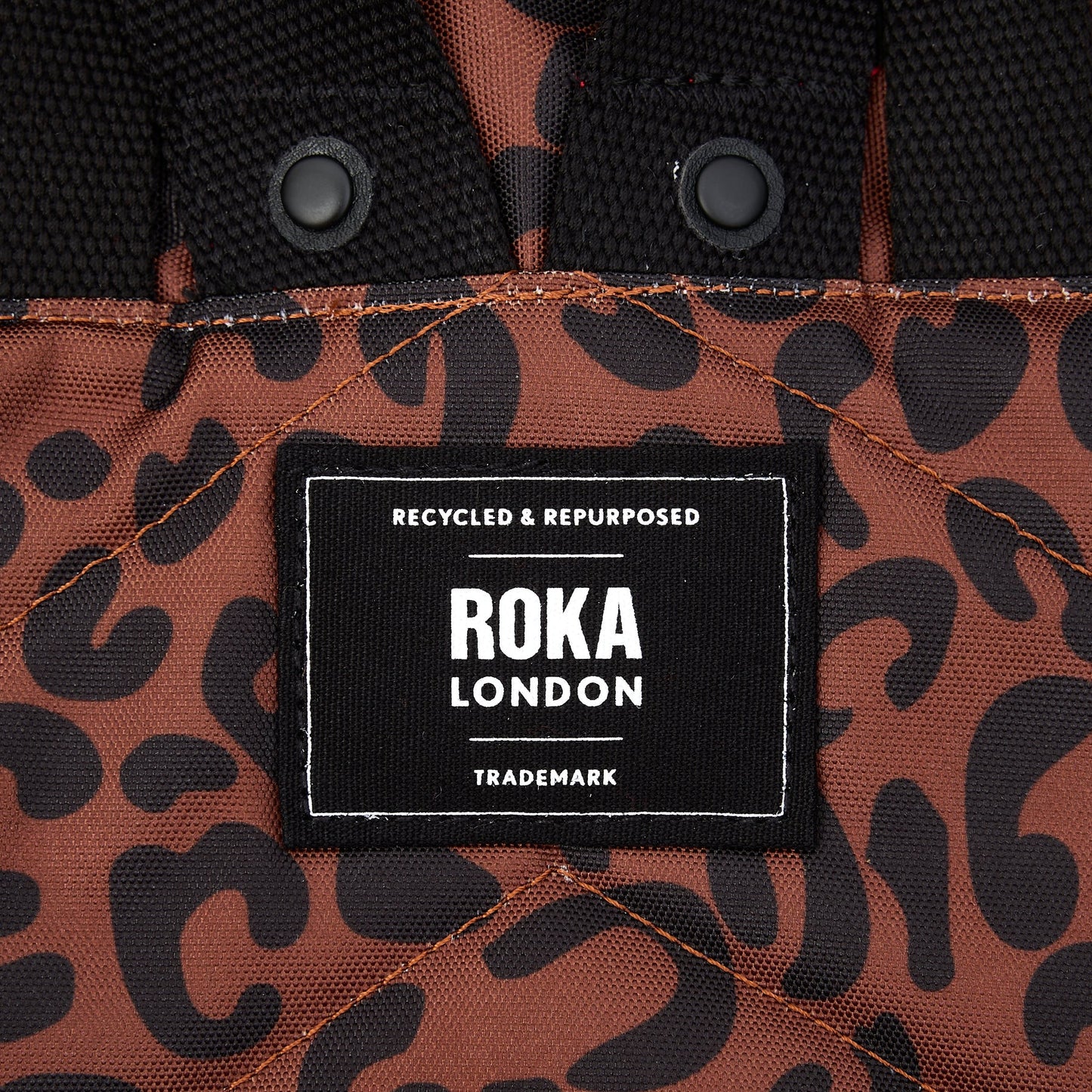 Canfield Roll Top Medium Backpack in Scarlet Leopard