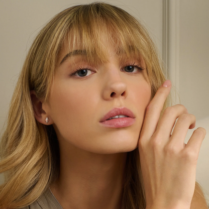 Nature's Wonder Sterling Silver Seashell Stud Earrings with Topaz