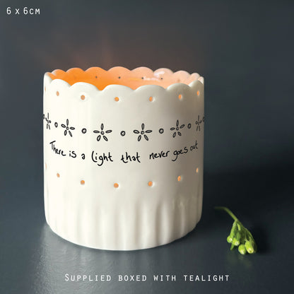 Scallop tea light holder - There is a light