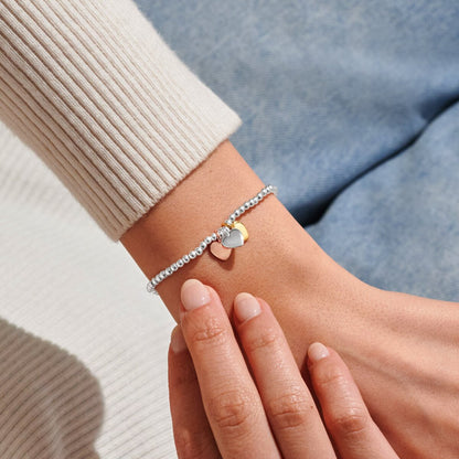 A LITTLE CHARMED MOMENTS FRIENDSHIP BRACELET