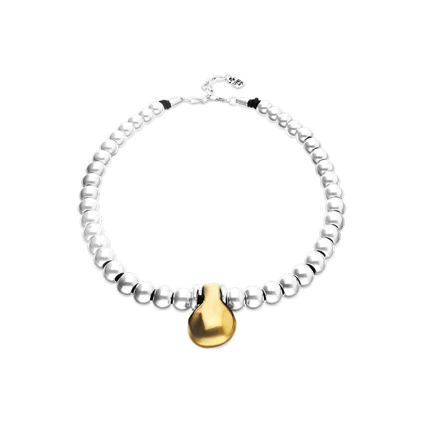 Beaded necklace with medium spheres and a large sphere