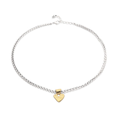 Short chain necklace with small gold heart detail
