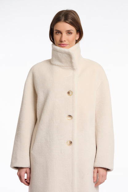 Faux fur coat with high collar