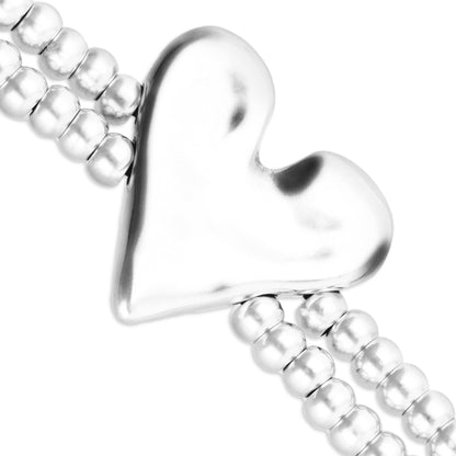 Double elastic bracelet with heart detail