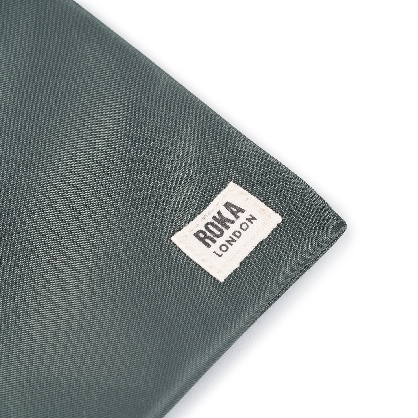 Chelsea Pocket Sling Bag Small in Thyme