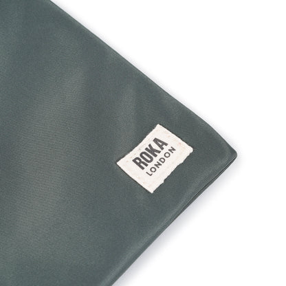 Chelsea Pocket Sling Bag Small in Thyme