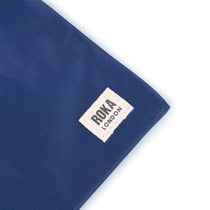 Chelsea Pocket Sling Bag Small in Crisp Blue